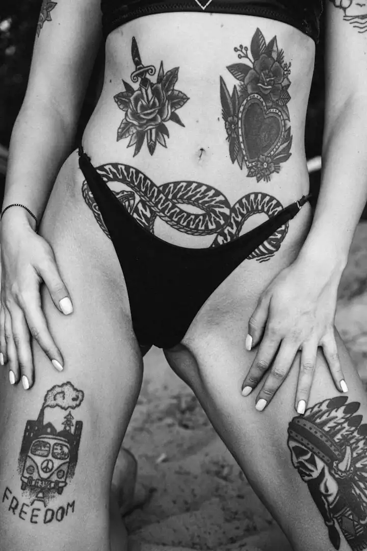 thigh tattoo on girl